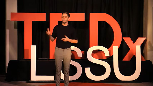 Image of Brandan Robertson speaking at TEDxLSSU: Identity